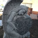 Custom Leaning Angel Shaped Headstone